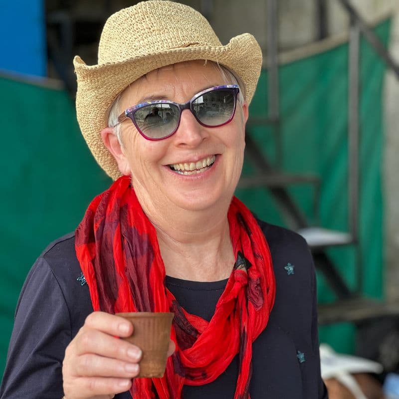 lady with cup of chai