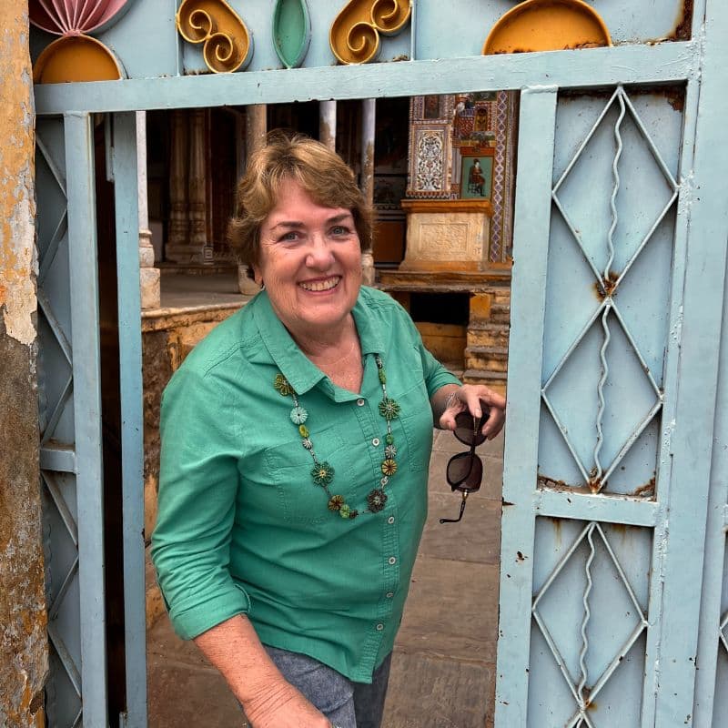 lady walking through doorway in India